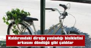 KALDIRIMDAKİ DİREĞE YASLADIĞI BİSİKLETİNİ  ARKASINI DÖNDÜĞÜ GİBİ ÇALDILAR