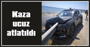 VİRAJI ALAMAYAN OTOMOBİL, REFÜJE SAPLANDI